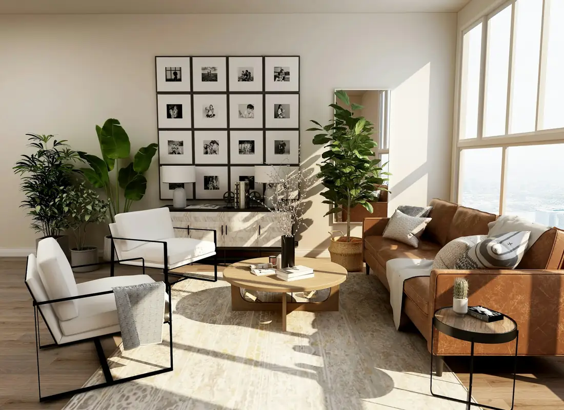 Family room with leather sofa, plants and tall windows